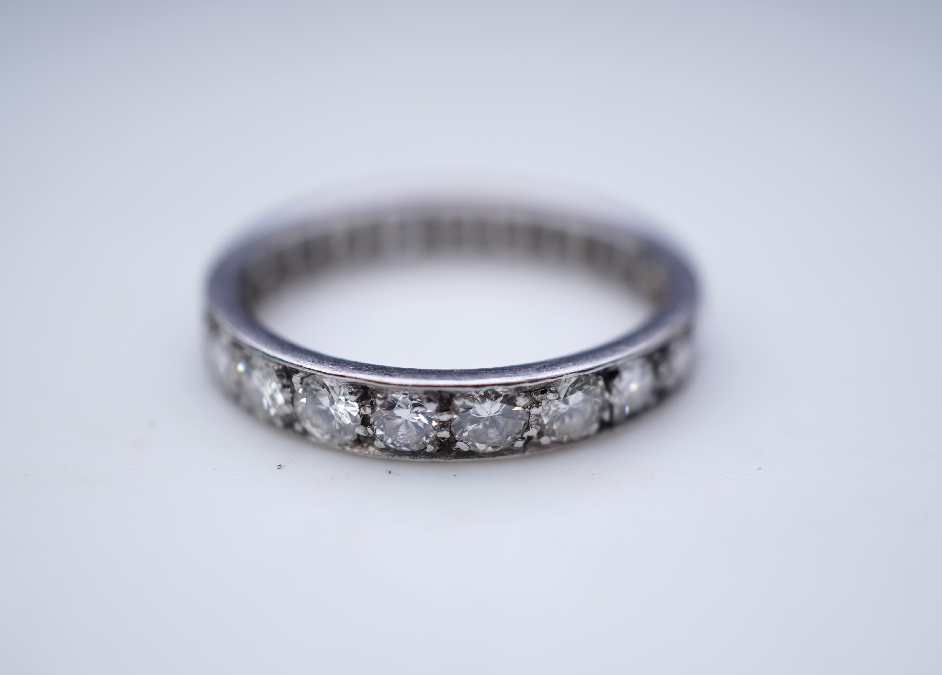 A diamond eternity ring, mid 20th century